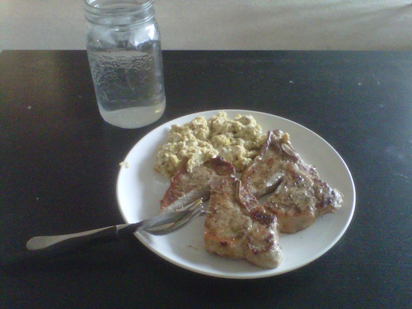 Pork chops, eggs, and water - a healthy meal