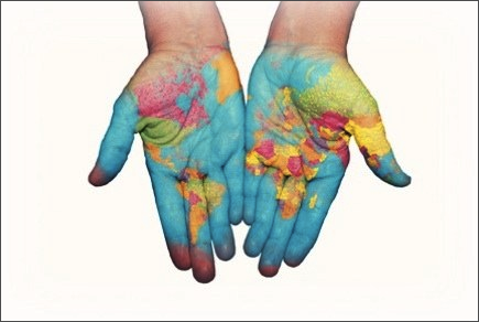The world painted on a pair of hands