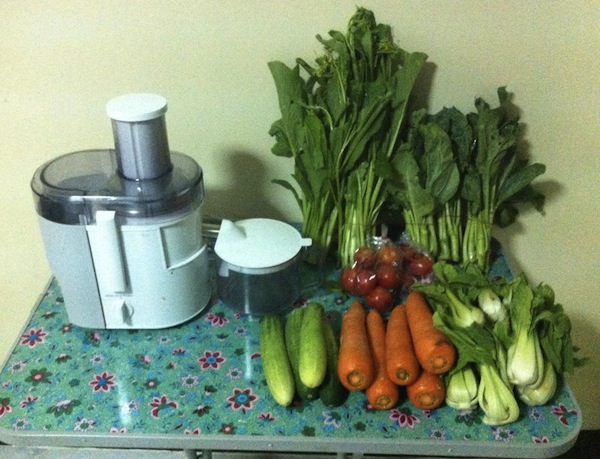 Vegetables for a green juice and a Jack Lalanne juicer